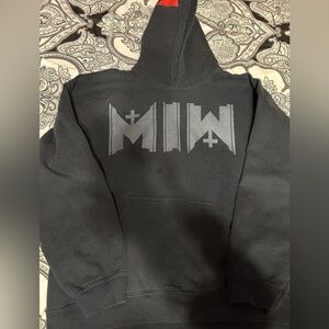 Motionless in white hoodie
